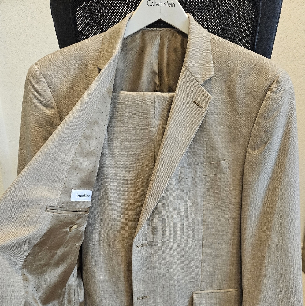 Calvin Klein mens suit tan brownish. Coat 44R and Pant is 36w x 32l.